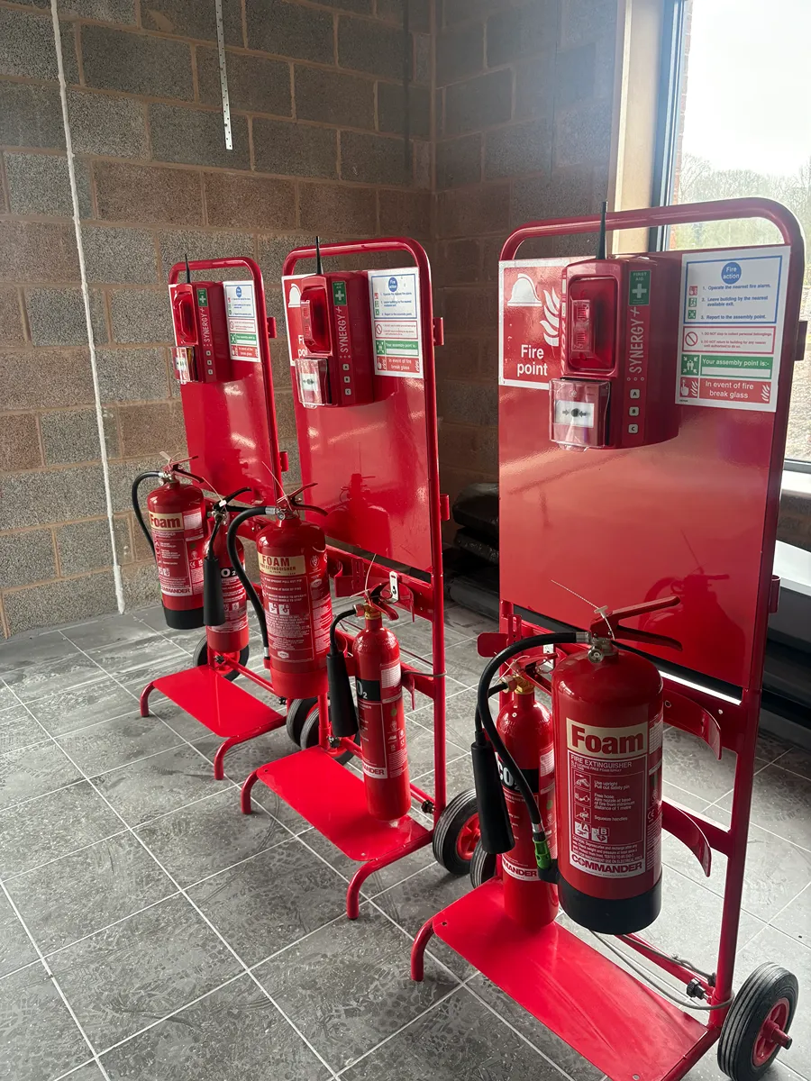 Row of fire trolleys indoors